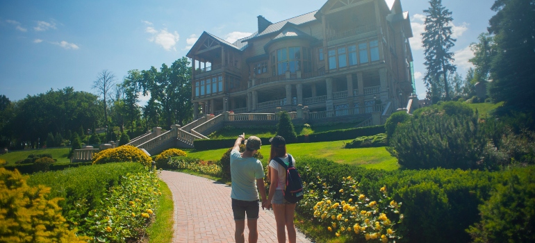 a couple looking at a house