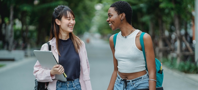 two high school girls going to school