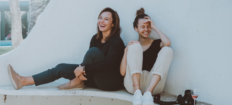 two female friends laughing