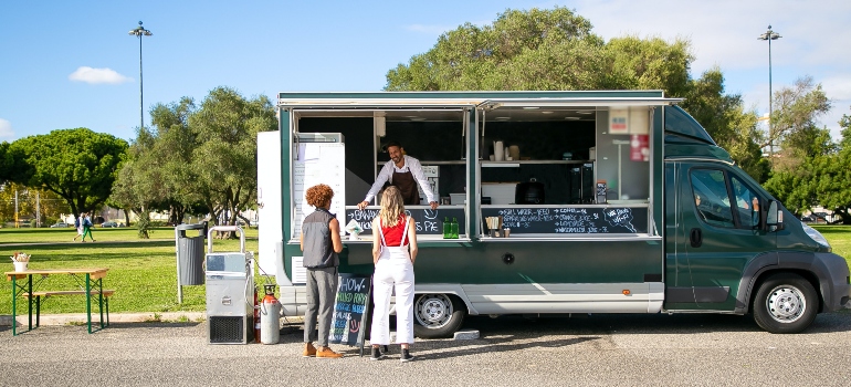 people buying food from a food truck