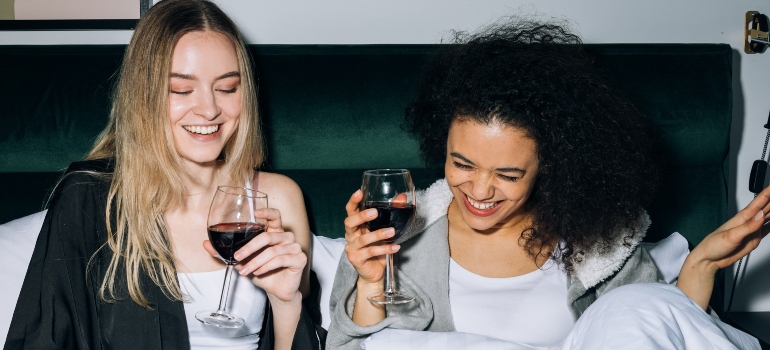 two female friends laughing 