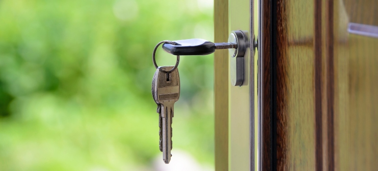 a key in a door to a house