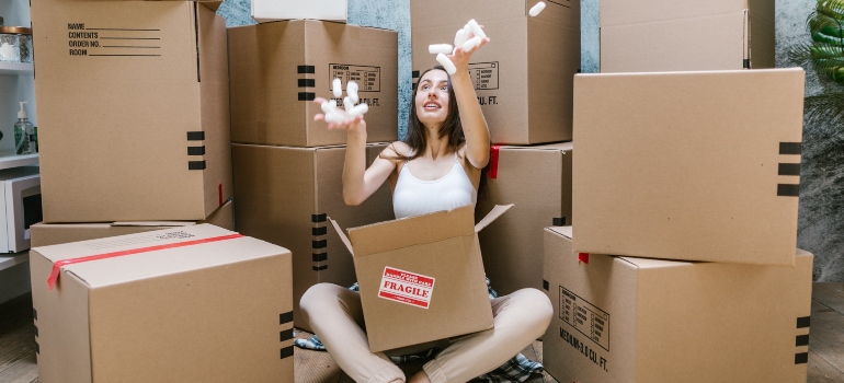 a woman packing for a move