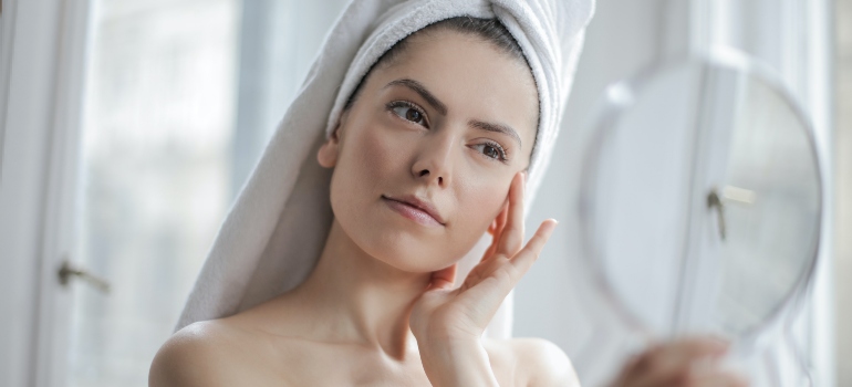 a woman doing skincare