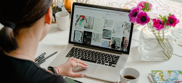 a woman typing on a computer